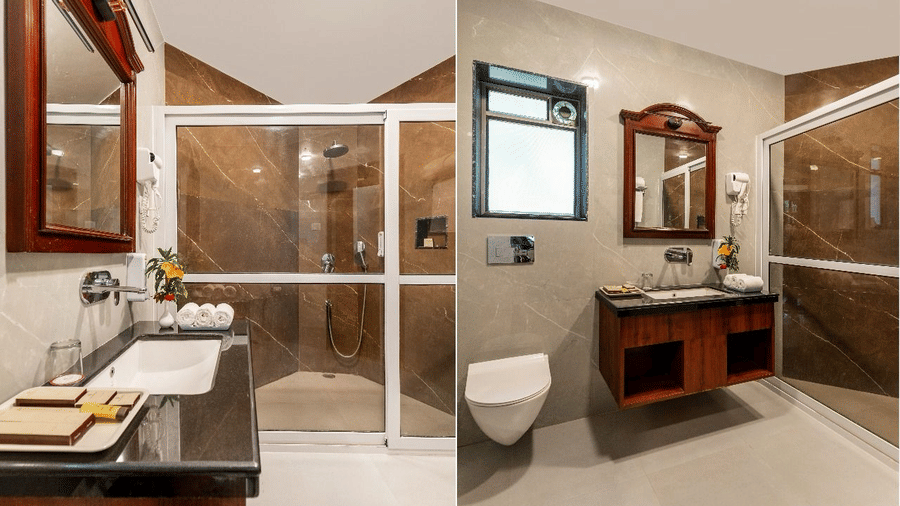A split-screen view of a modern bathroom showing a black stone vanity counter, a mirror, a toilet, and a glass shower stall at Amantra Shilpi Resort, Udaipur.