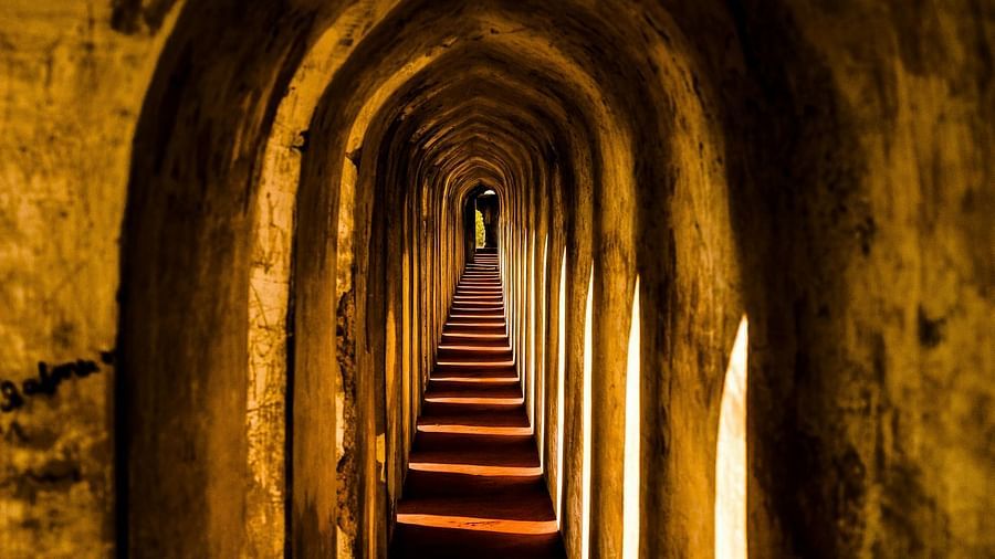 Image of arched wall with sunlight seeping though the openings in the wall - The Dukes Retreat, Khandala