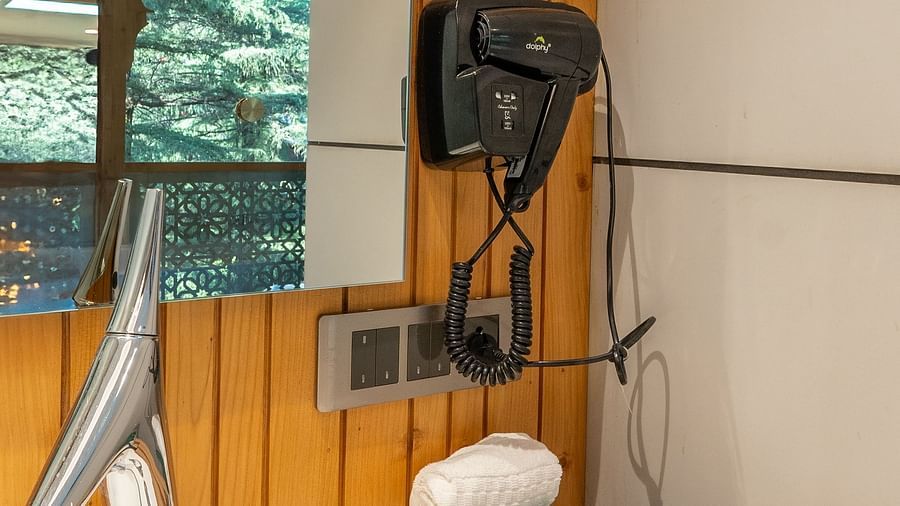 an image of a suite bathroom with toiletries at Mastiff Select Mandavya Dharamkot, McLeodganj