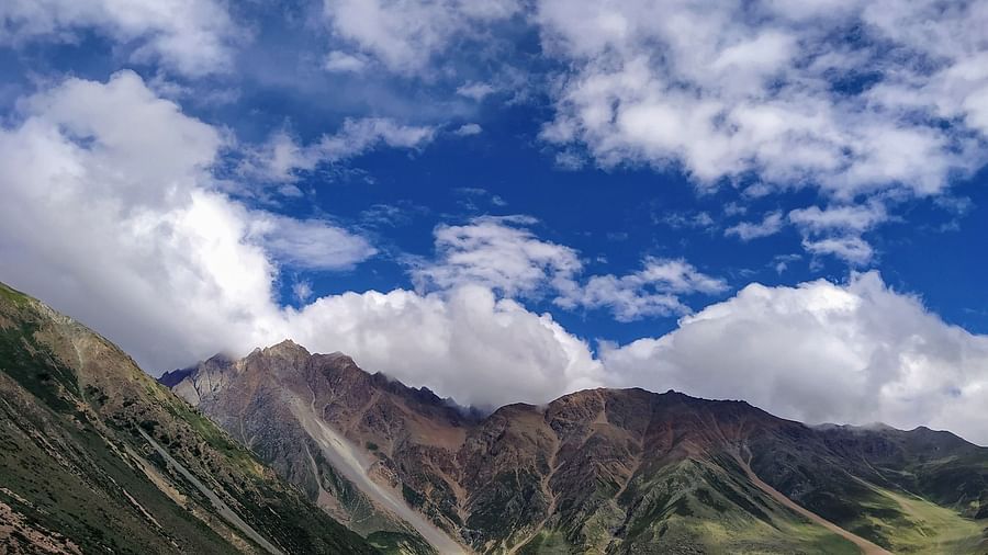  An image of valleys, mountains, and an open sky | Faraway Cottages, Auli