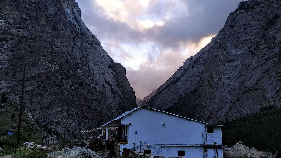 Aerial view of Niti Valley with a house between two valleys | Faraway Cottages, Auli