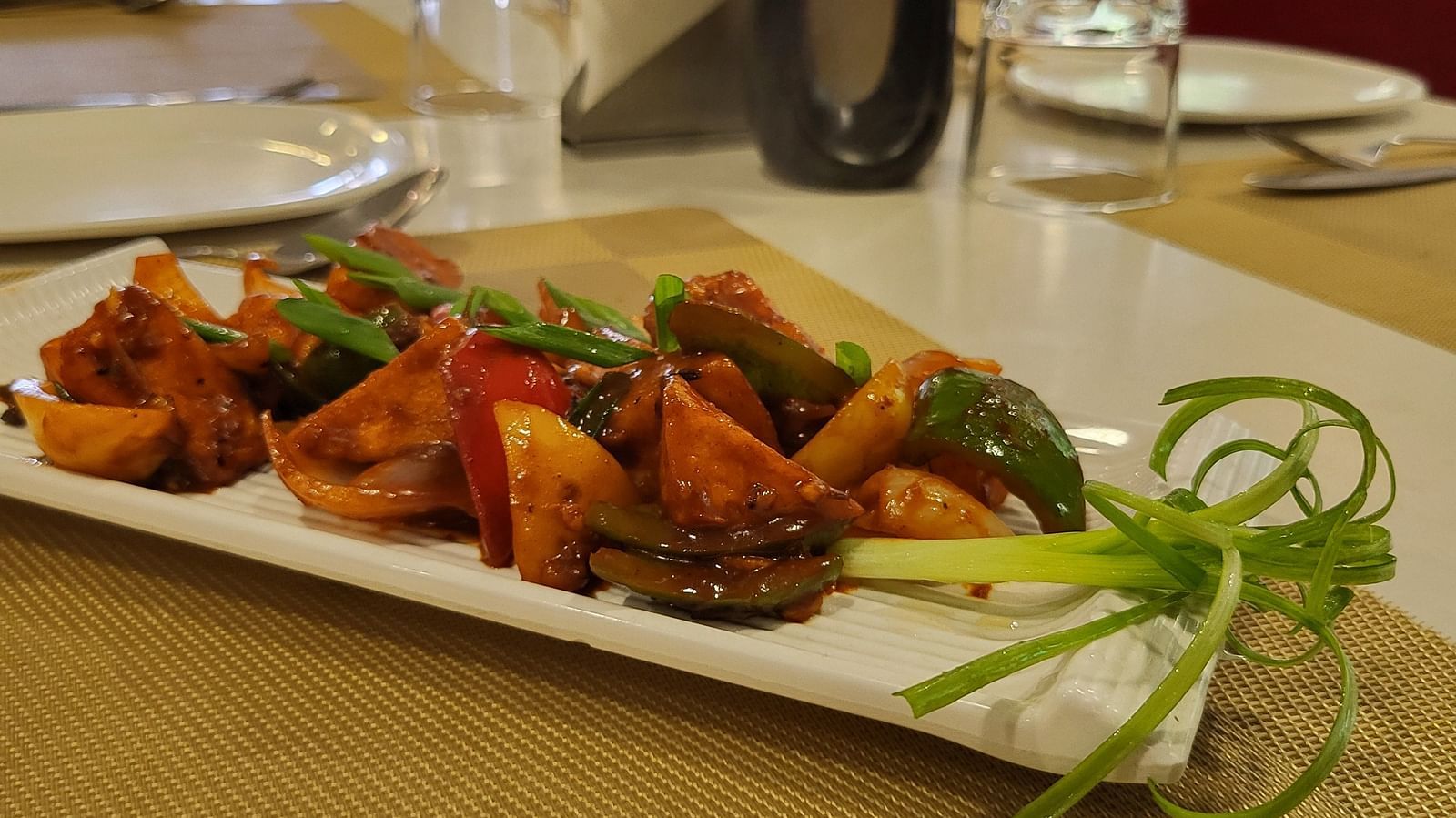 An image of a delicious savoury served in a platter at the restaurant of Inde Hotel Gold Course Extension, Gurgaon
