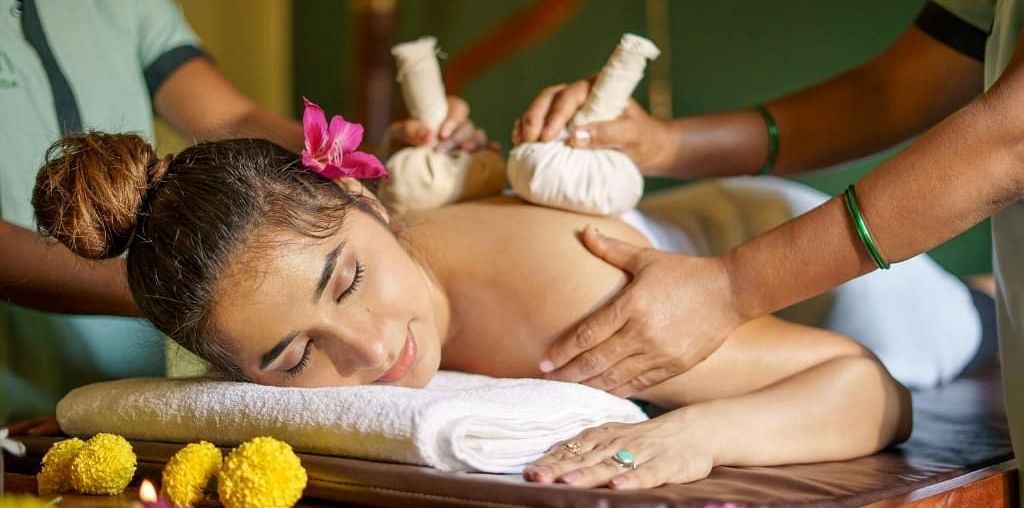 Two Spa Therapists massaging a model at Ocean Spray Puducherry 