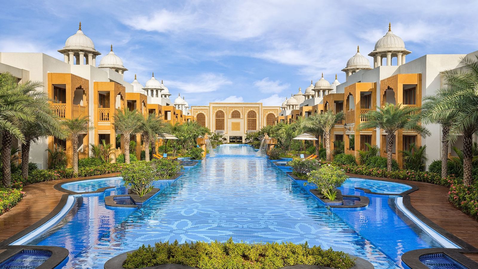 Grand view of the central water feature surrounded by luxurious architecture at our palace - Kaldan Samudhra