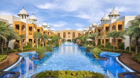 Grand view of the central water feature surrounded by luxurious architecture at our palace - Kaldan Samudhra
