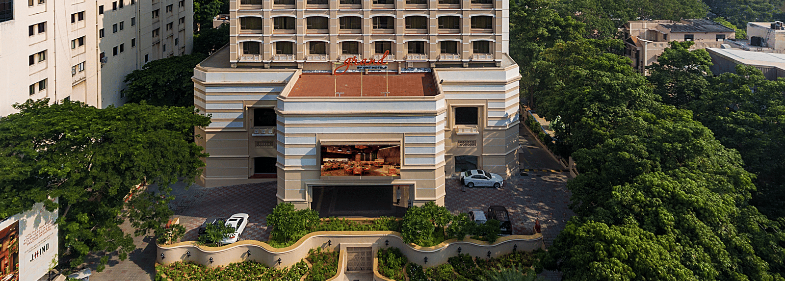 Facade view of Grand Chennai By GRT Hotels during day time.