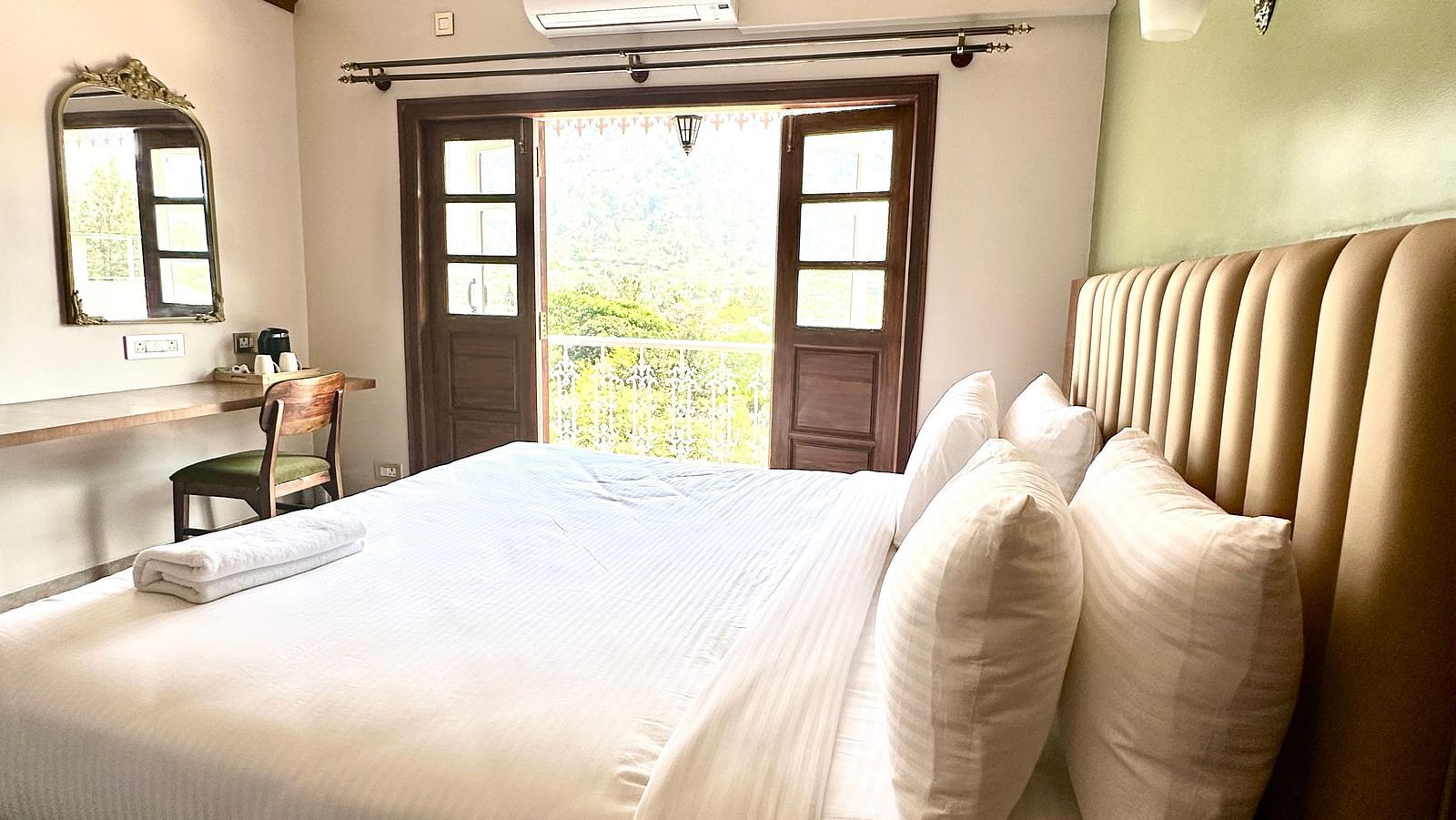 a double bed in the Heritage Suite at Summer House, Nandi Hills