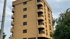 A side angle view of our hotel building seen from a road at VITS Select Kharadi, Pune.