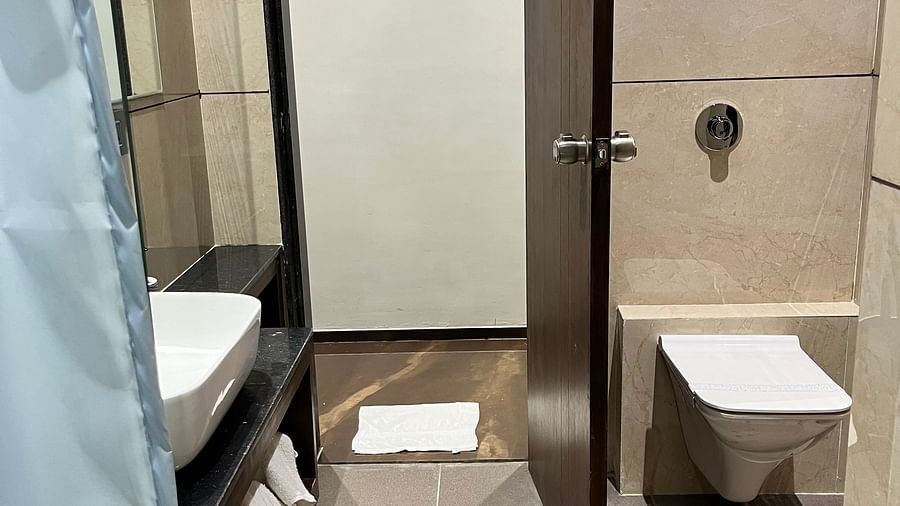 Bathroom entrance in standard room - VITS Jamnagar, Mithoi