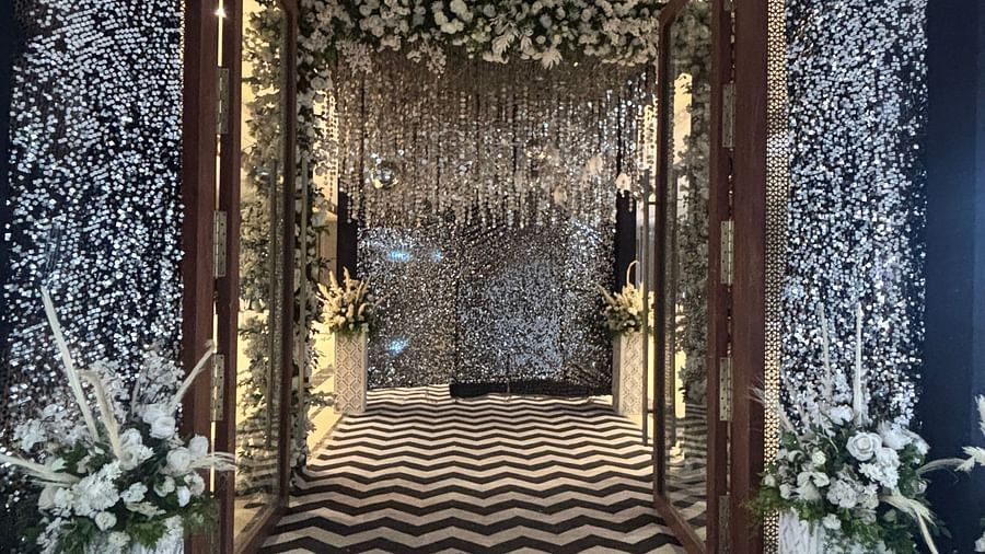 Luxurious Entrance Decorated with Flowers and Curtains