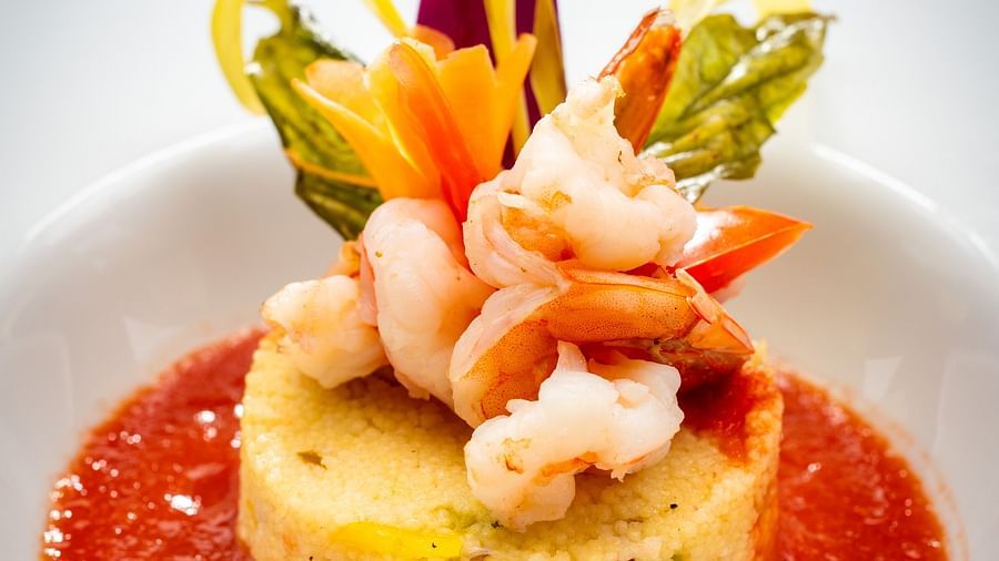 An image of a Jamaican dish made of rice and prawns served with red sauce - S Hotel Montego Bay, Jamaica