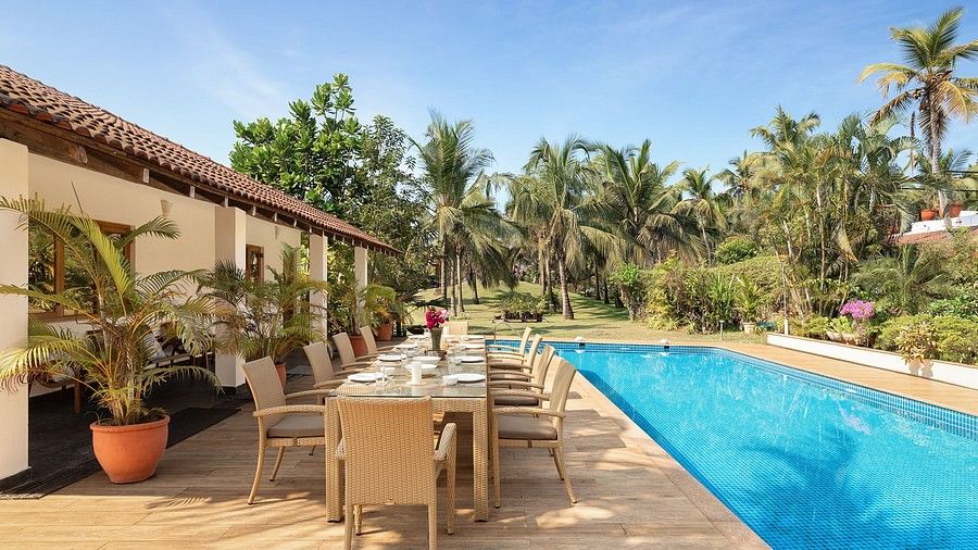 The swimming pool and sitting area by it
