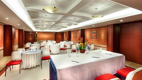 An image of an event hall with chairs at Regency Madurai by GRT Hotels