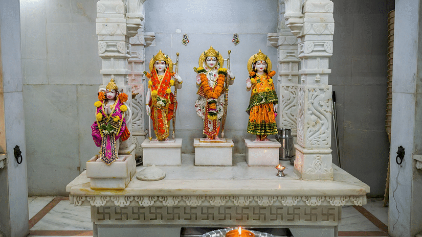 Statues of four deities adorned with garlands and traditional wear - The Dukes Retreat, Khandala