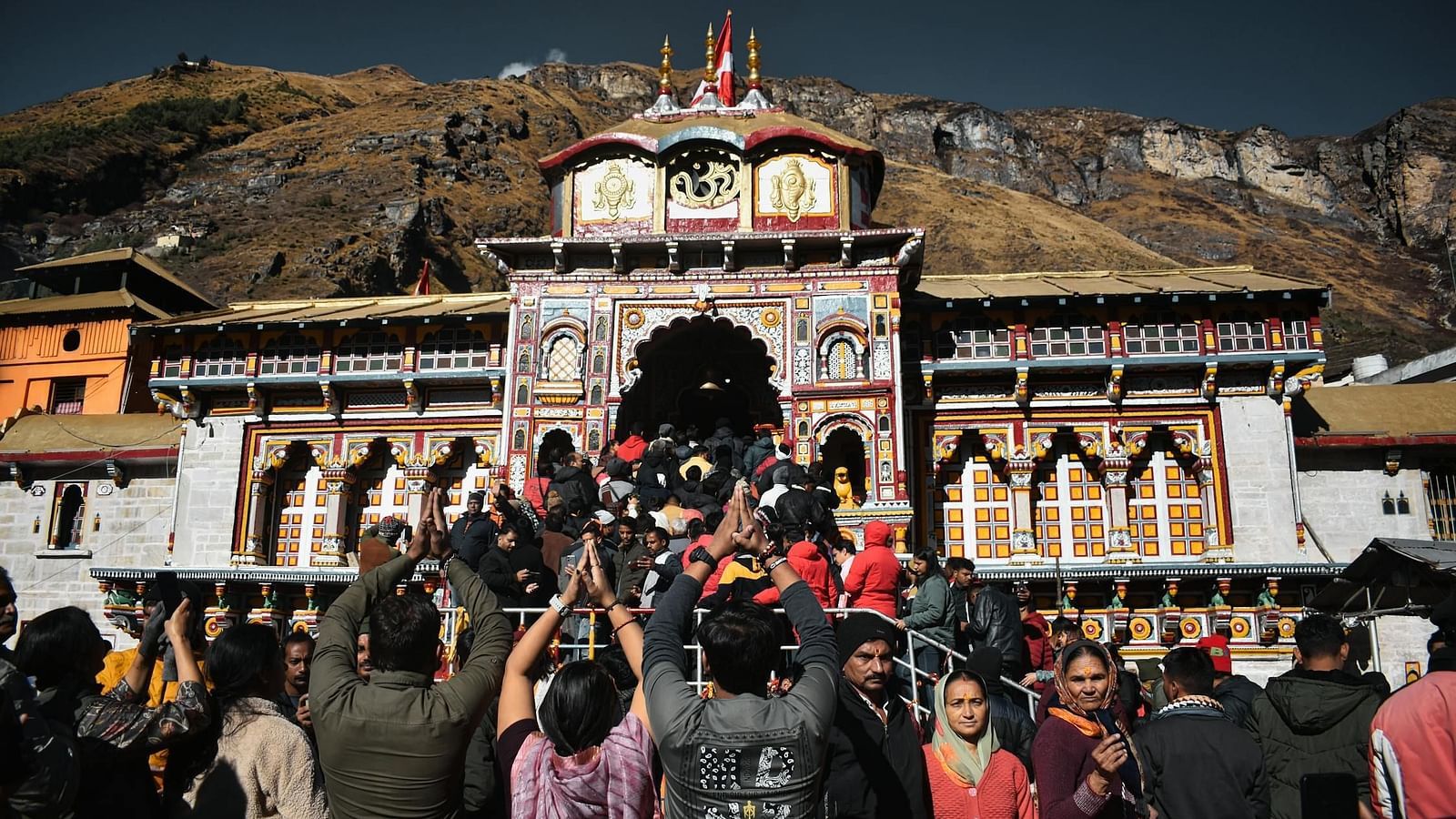 Image of people gathered outside of Shree Badrinath Temple | Faraway Cottages, Auli