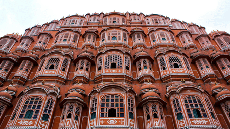 View of Hawa Mahal Palace with intricate latticework and jharokhas.