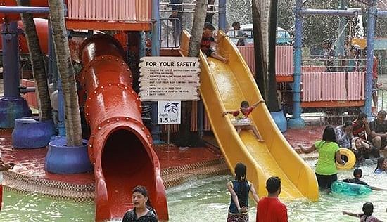 Water Kingdom - a group of people in a play area at our water park