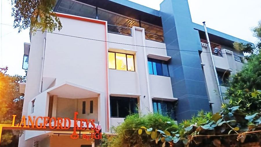 The main entrance of Langford Keys Hotel, surrounded by lush greenery - Hotel Langford Keys by TGI, Shanti Nagar