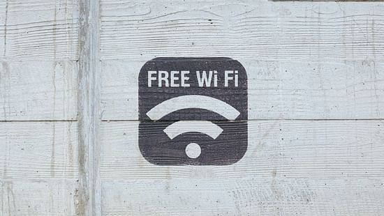 A print of Wi-Fi symbol on the wall that reads Free Wi-Fi