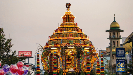 Crowd gathered at a temple during a traditional festival celebration