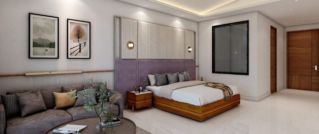 A spacious room featuring a double bed alongside a common seating area. - Namaste Corbett
