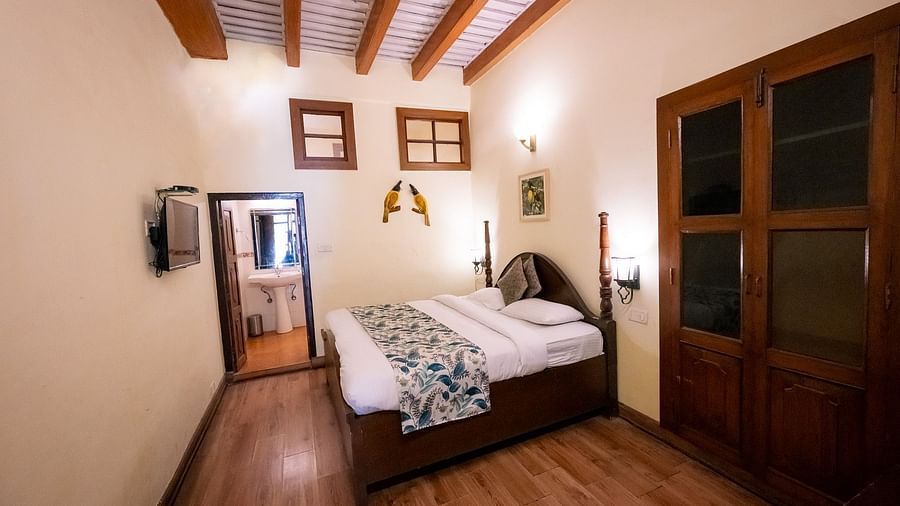 Spacious Garden facing Heritage suite with a cosy bed at The Pavilion, Nainital