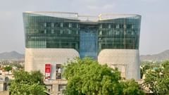 An aerial view of our hotel surrounded by lush greenery seen during a sunny day - Sarovar Portico, Ajmer 