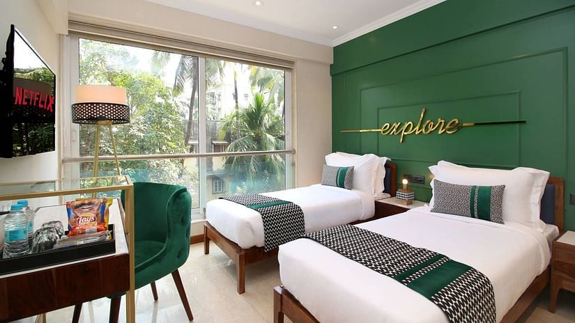 twin beds at the private 4 bedroom suite in bandra - theory9 service apartments
