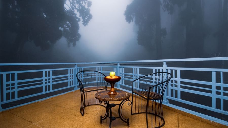 Suite With Balcony features balcony seating with two chairs and a round table at Mount Lungta Boutique Hotel & Spa