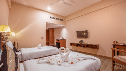 bedroom with a heart made from towels