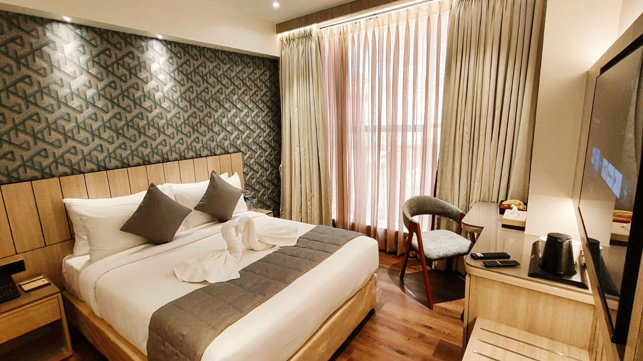 Side view of hotel room with modern amenities at Maxxvalue Hotel MIDC,  Mumbai