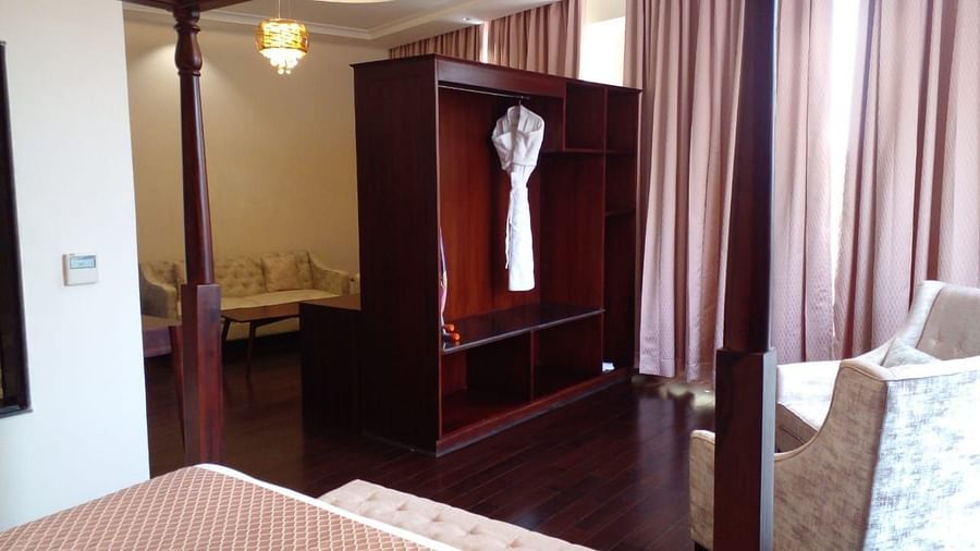 Four poster bed and wardrobe at our Luxury  hotel in Shimla - The Orchid Hotel Shimla