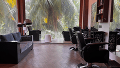 Salon area with chairs facing mirrors and outdoor view at Silver Sand Beach Resort, Havelock.