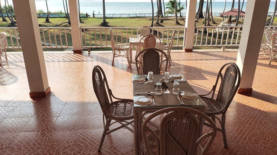Table and chairs at an open-air restaurant