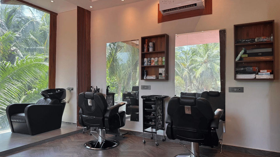 Salon interior with multiple styling chairs and mirrors at Silver Sand Beach Resort, Havelock.