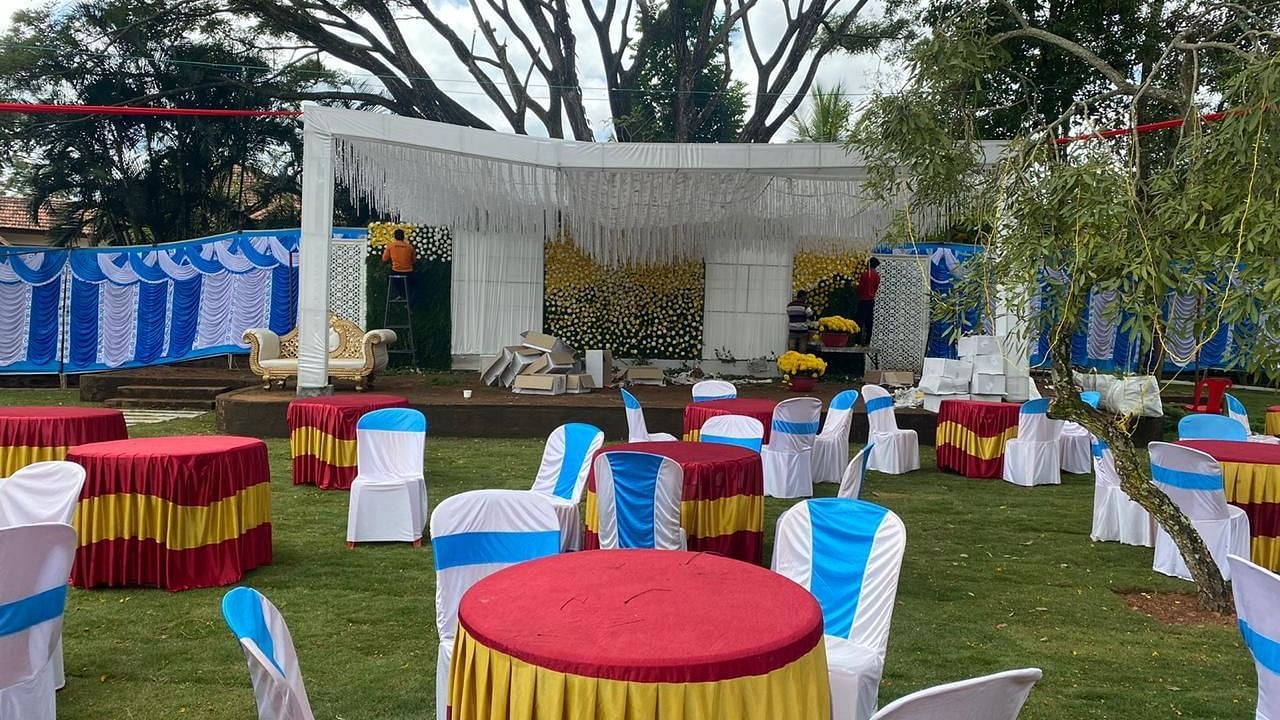 image of the seating arrangement at the lawn for various banquets and events at Hoysala Village Resort, Hassan.
