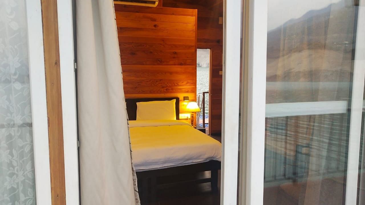 view of floating hut bedroom from outside - Le ROI Floating Huts Eco Rooms
