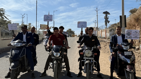 Group of riders on motorcycles during an outdoor activity by Lords Hotels and Resorts.