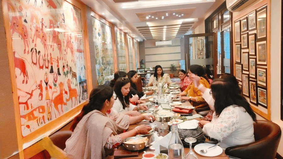 A group of ladies dining at the New Coffee Shop - Amantra Comfort Hotel
