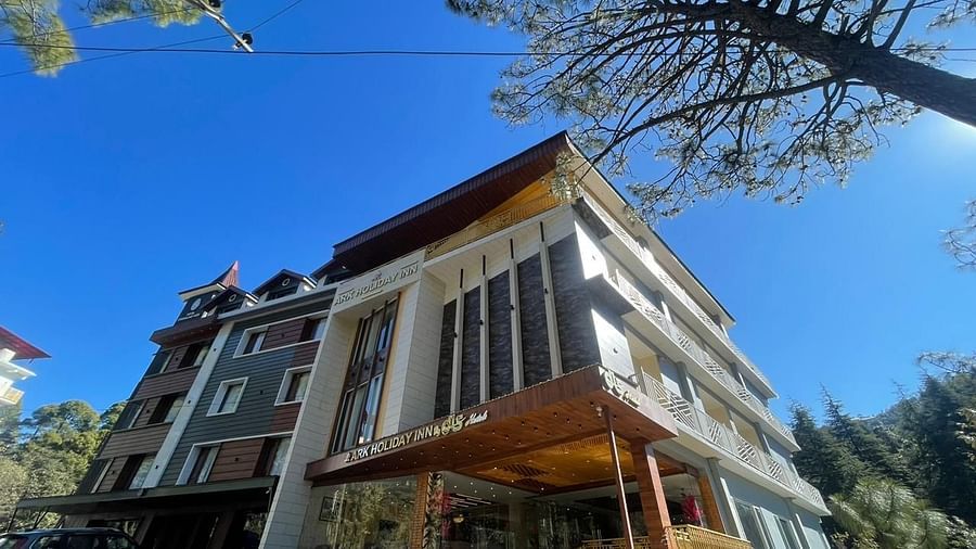 Exterior view of DLS Ark Holiday Inn, Banikhet during the day.