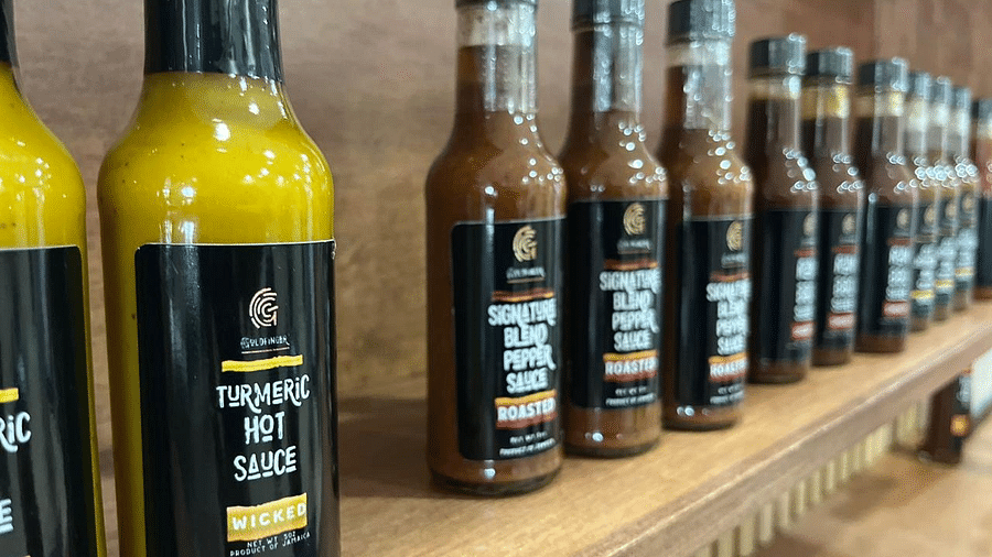 A collection of sauces sold placed on a rack at our gift shop in Montego Bay - Hotel 39, Jamaica