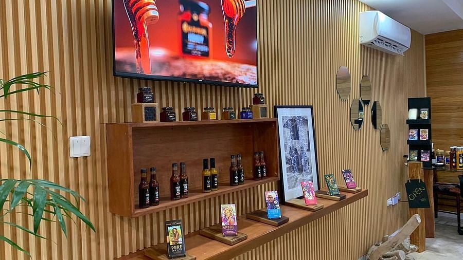 An interior image of Gold finger gift shop with souvenirs placed under a television - Hotel 39, Jamaica