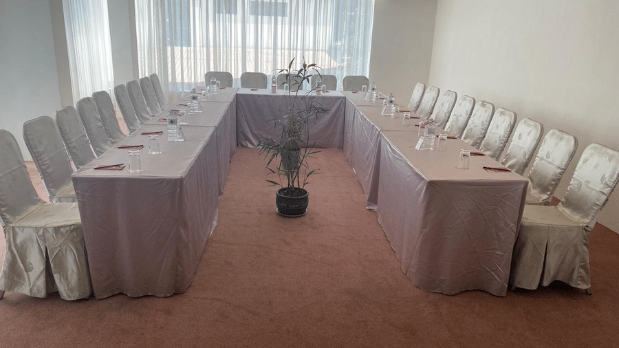 A banquet hall, windows with curtains 