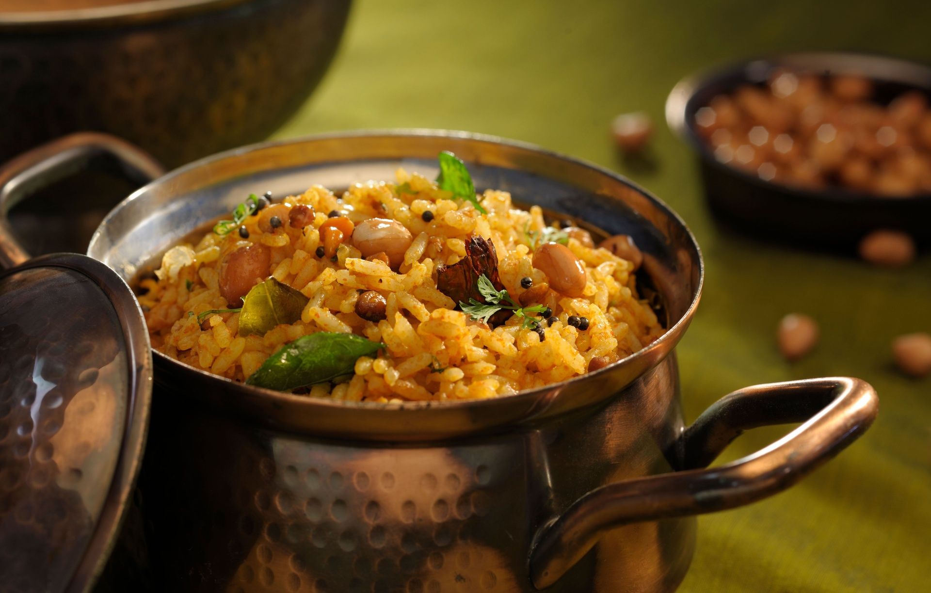 Pulihora: South Indian Tamarind Rice with peanuts.