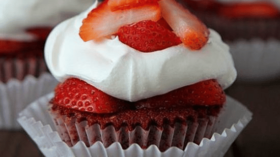 a closeup of a strawberry cupcake