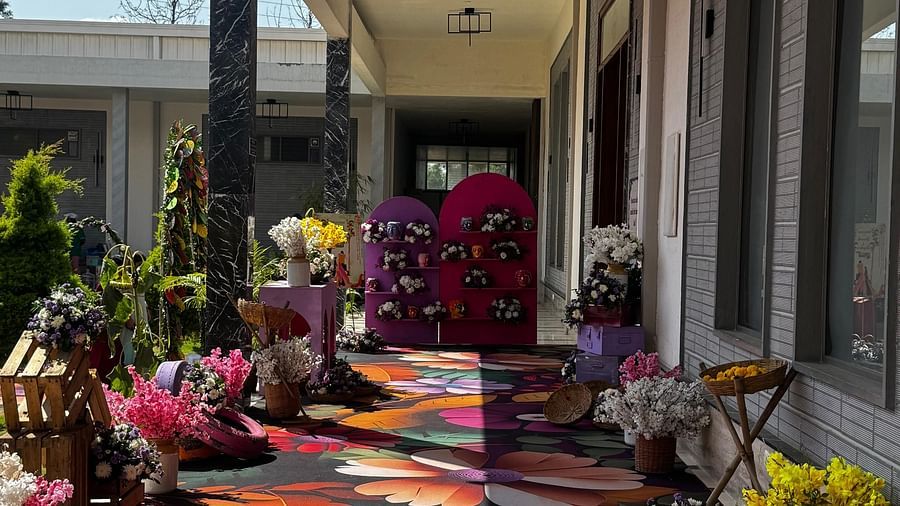 Floral wall arrangement with pink and purple hues for a wedding celebration at VRR Astoria Hotel and Convention Centre