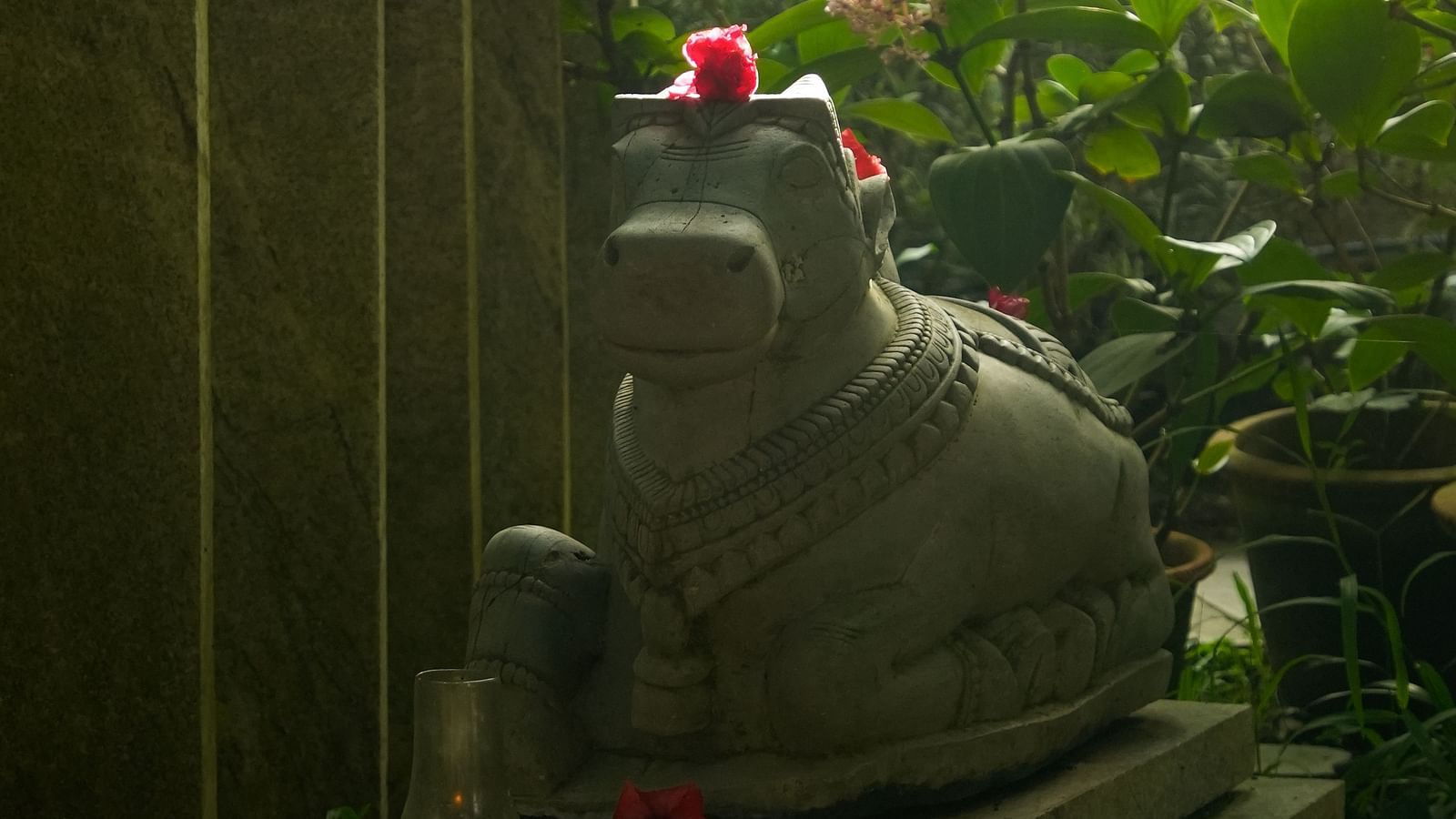 image of a stone sculpture of nandi at hoysala vilage resort, hassan