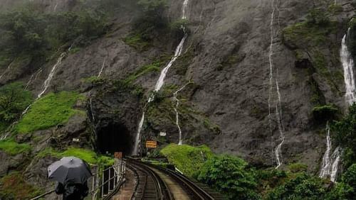 a waterfall cascading down a hill 4