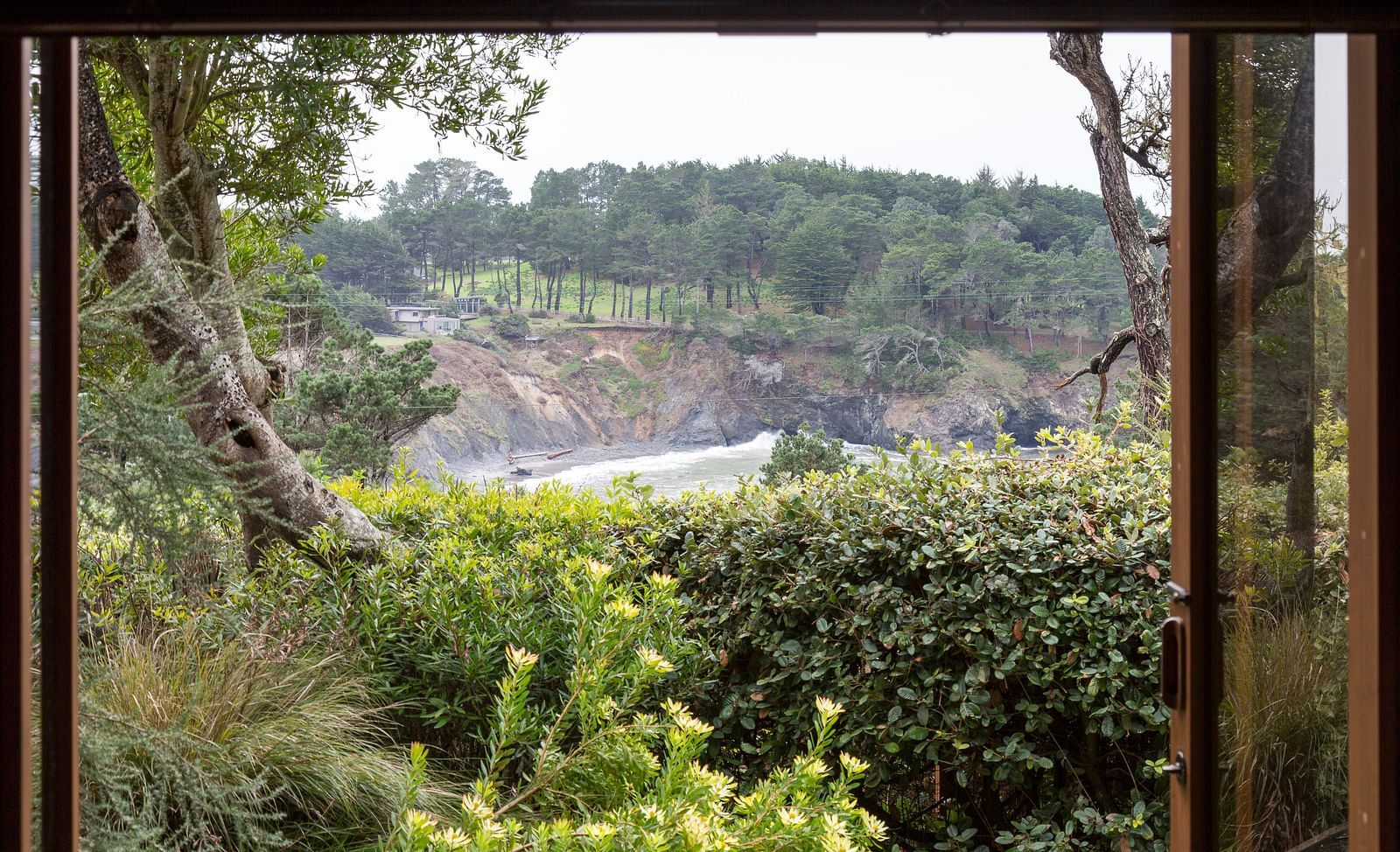 A window in our Mendocino hotel room offering the view of the Mendocino Coast - Brewery Gulch Inn & Spa