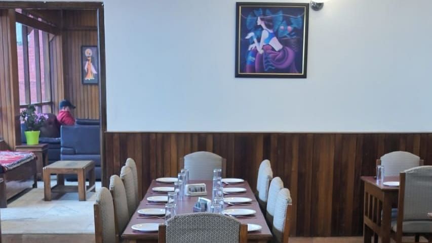 An image of the restaurant with its seating arrangement at Sumitel Chiminda, Pelling